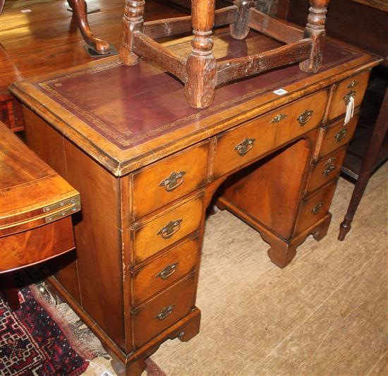 Queen Anne style walnut kneehole desk